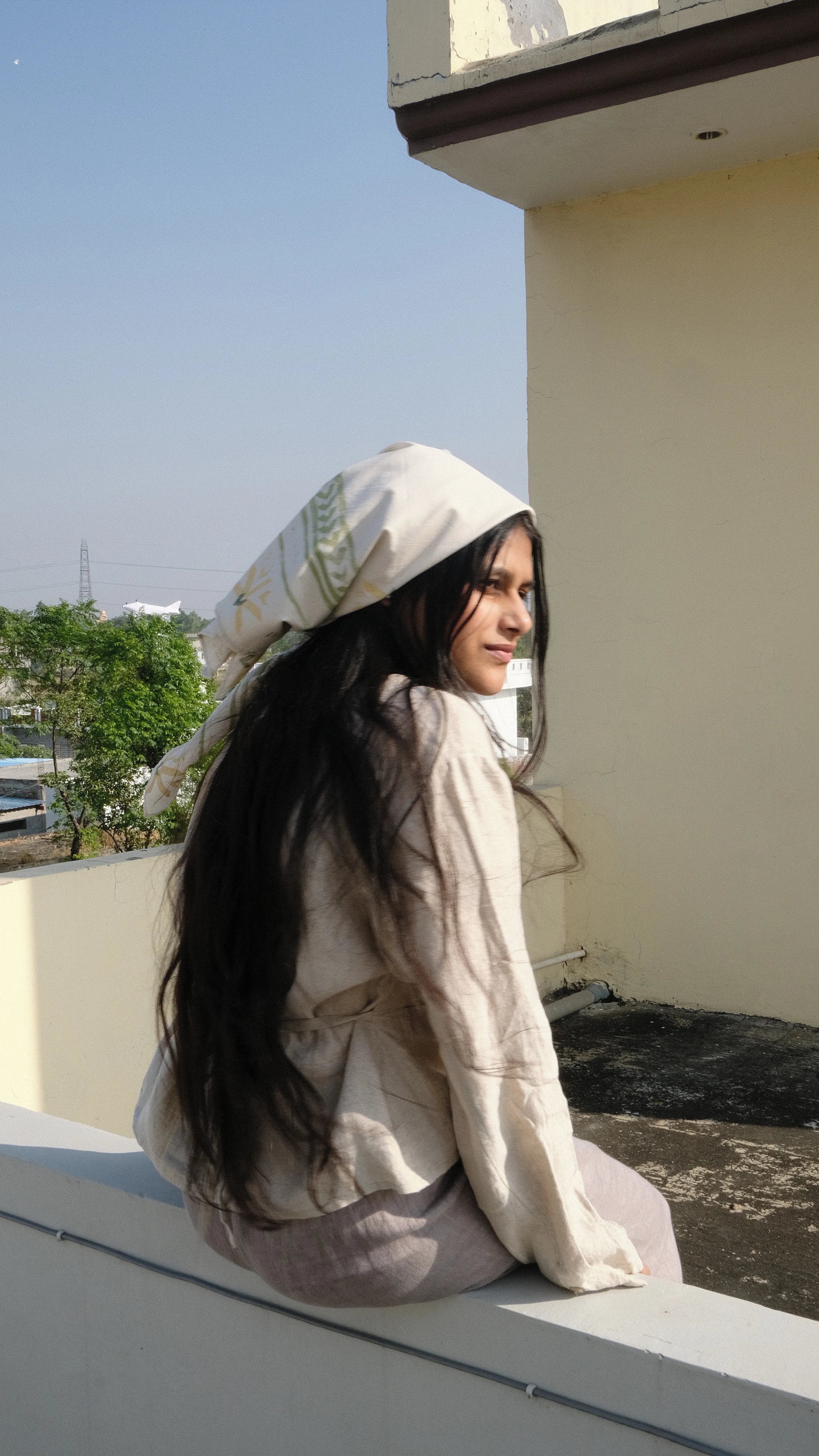 Girl on holiday with a headscarf styled