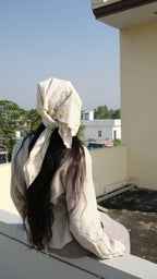 Scarf styled on girl on holiday