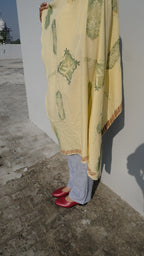 Scarf draped on girl standing on the rooftop in panjab