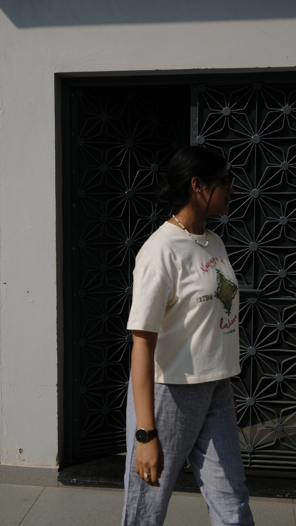 girl styled in handprinted tshirt in panjab courtyard