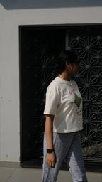 girl styled in handprinted tshirt in panjab courtyard