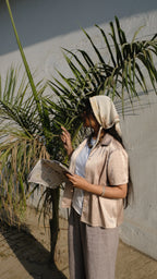 Girl looking at a map whilst exploring the city Lahore